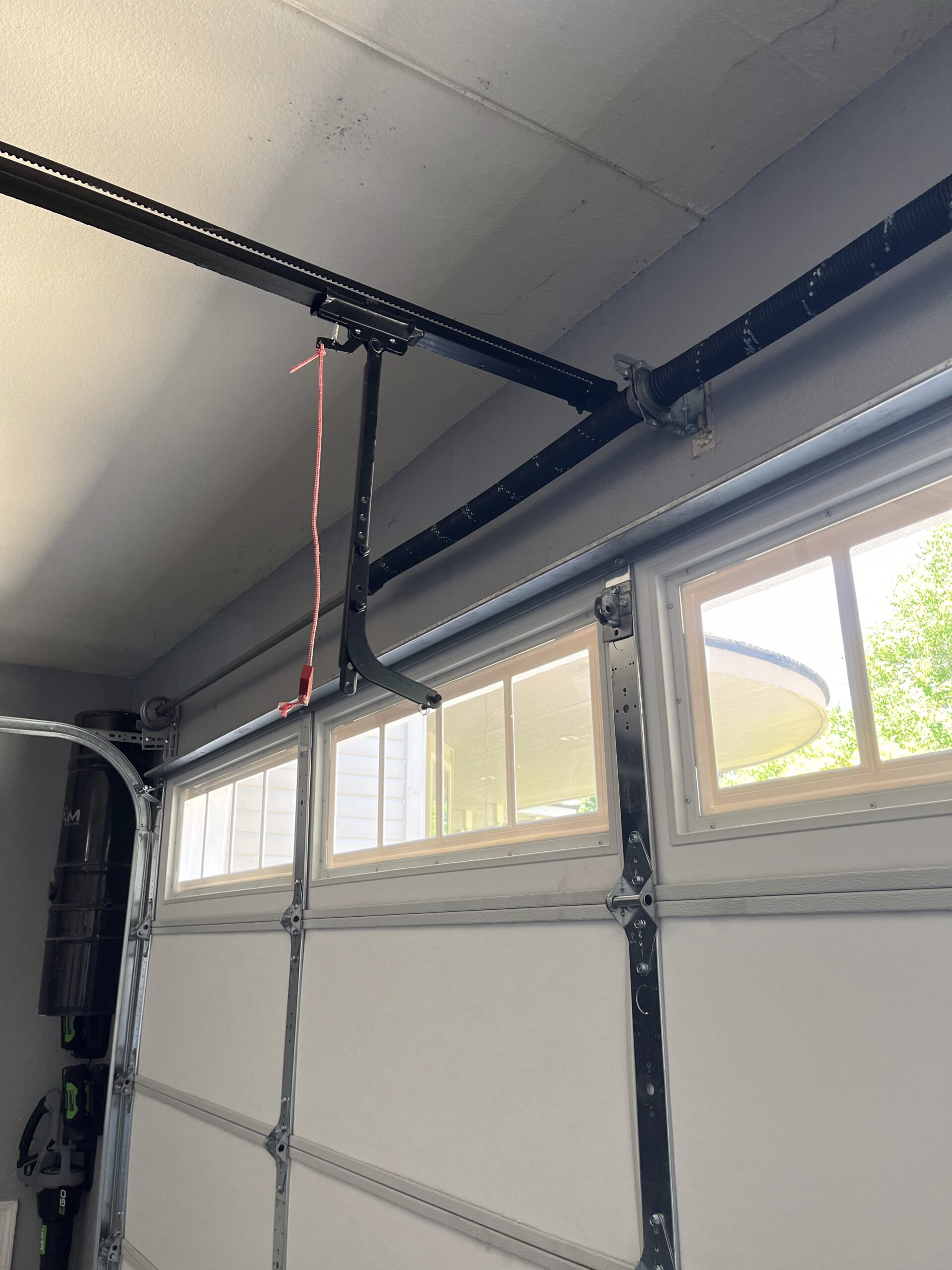 Garage Door Repair Case Study: Torque Master Spring Conversion