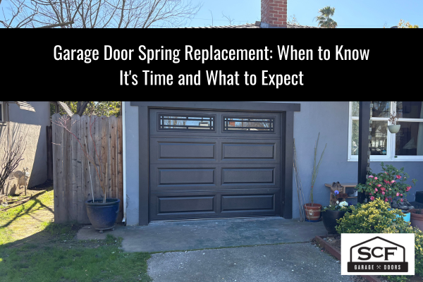 A modern home with a dark garage door, featuring a banner about garage door spring replacement tips.
